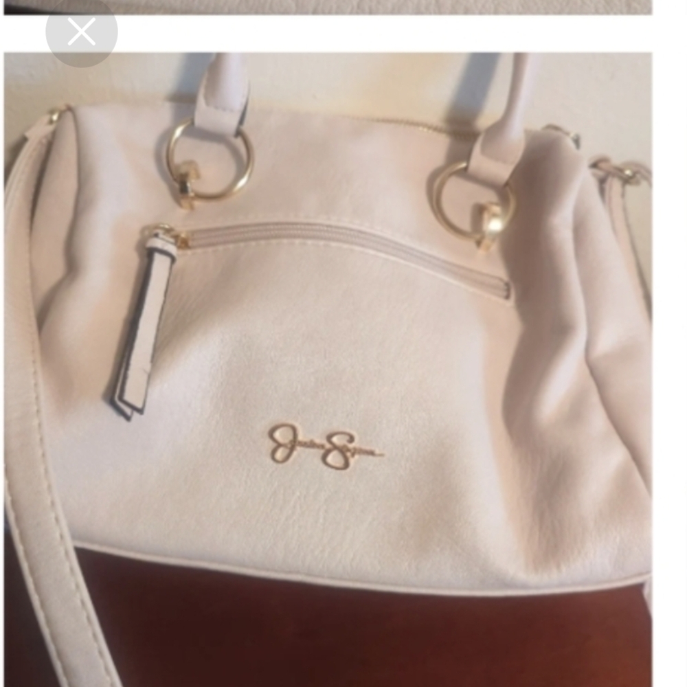 Jessica Simpson crossbody bag with rivets on the outside New without tag